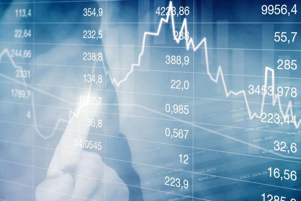 bluish picture of a hand showing a graph and numbers