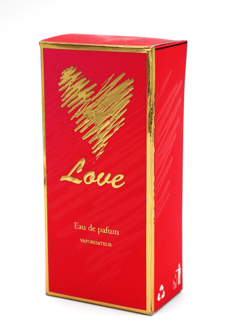 Photo d'un packaging de parfum rouge, avec un coeur en dorure et en vernis, ennoblissement sur JETvarnish de MGI