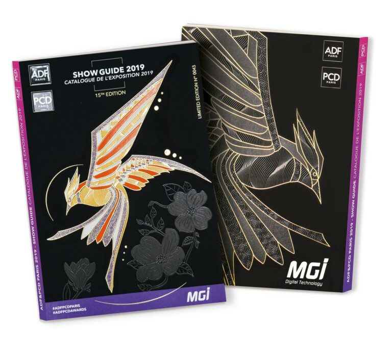 Photo de couverture de magazine avec oiseaux stylisés en dorure et couleurs réhaussées par du vernis - ennoblissement sur JETvarnish de MGI